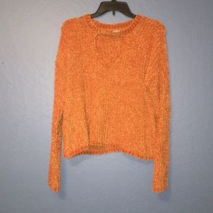 Fuzzy sweater with cutout